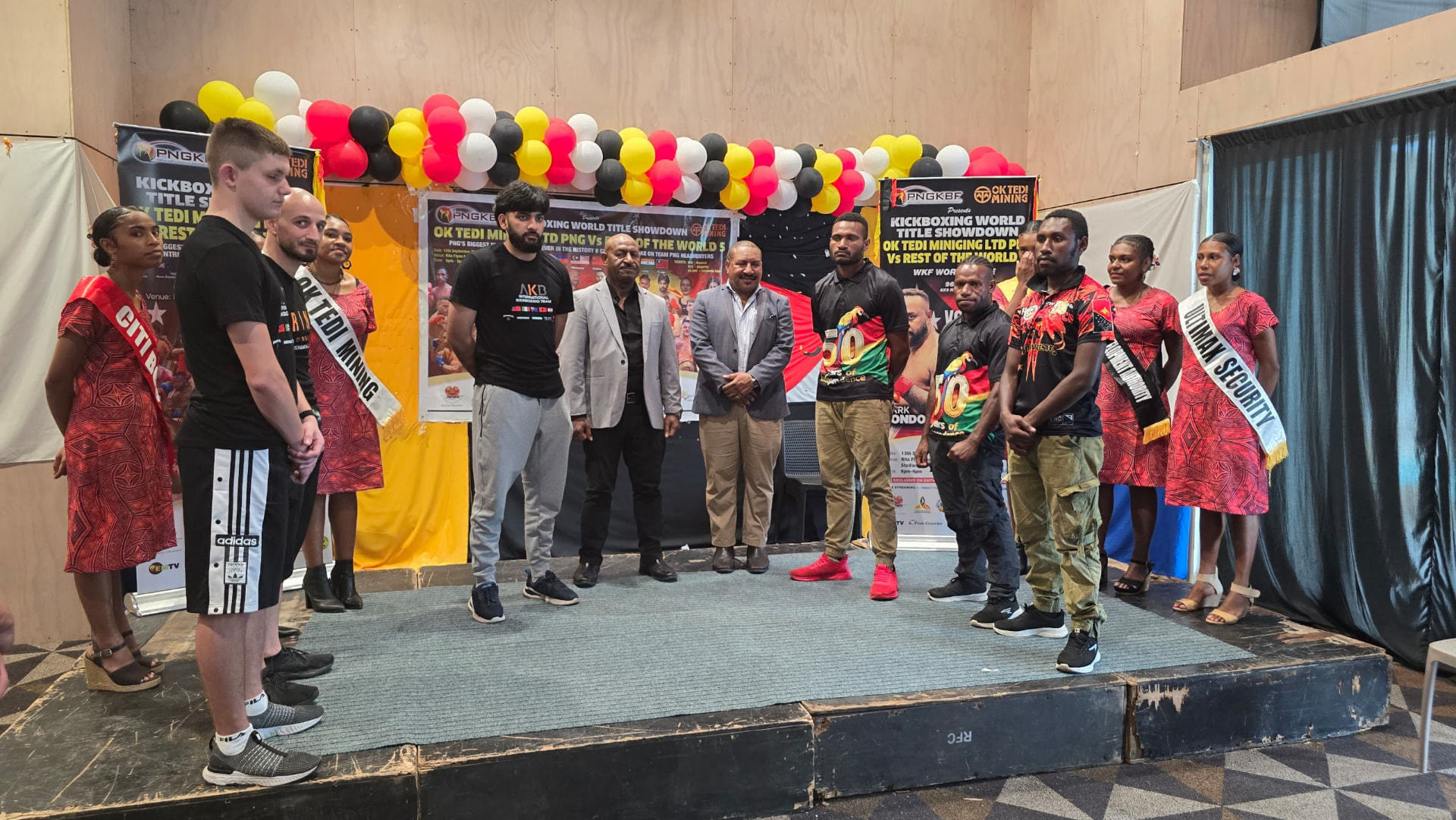 International and PNG fighters on stage with officials at the world title showdown launch